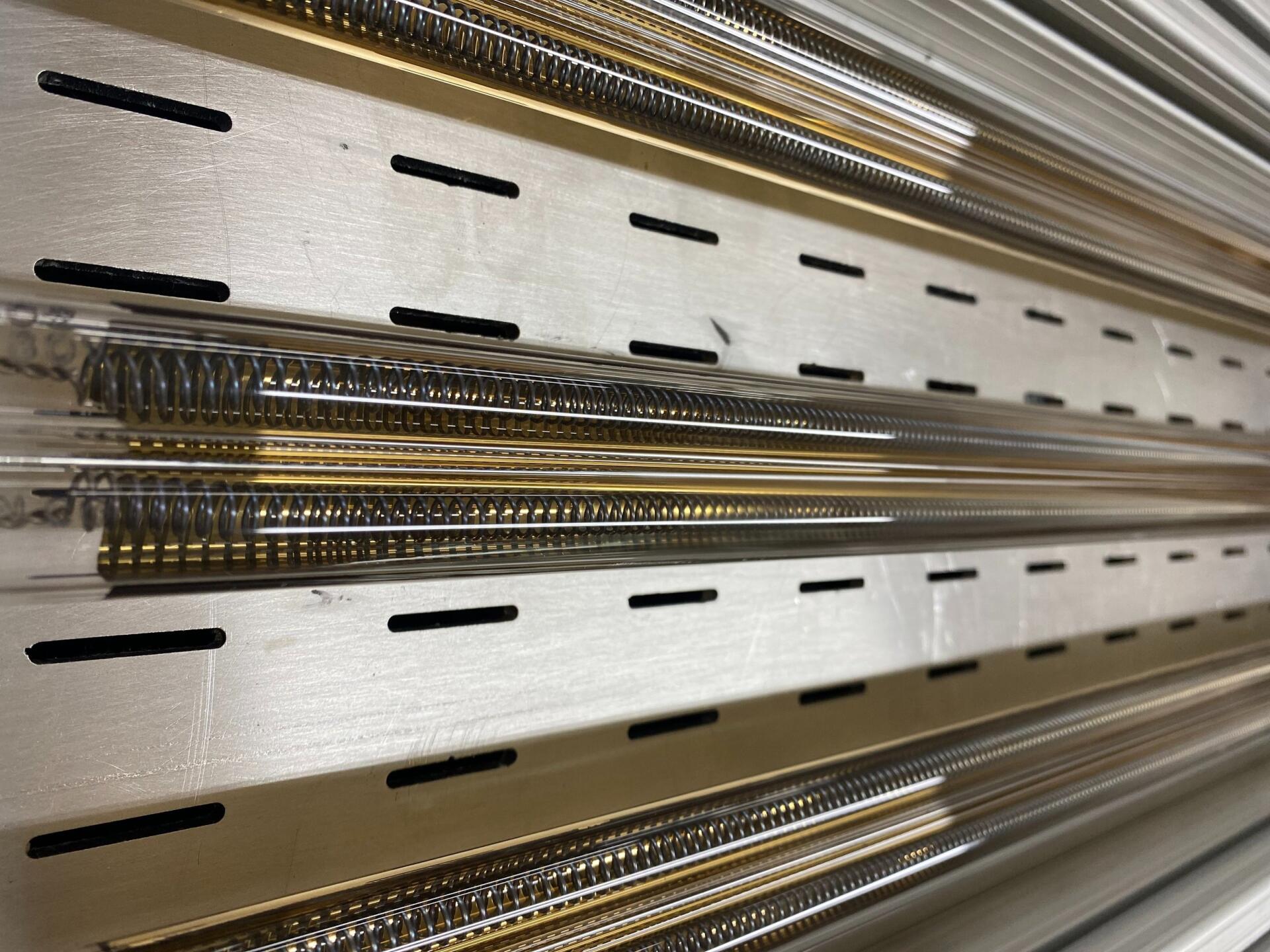 a wall of twin tube quartz infrared lamps from Fannon Products